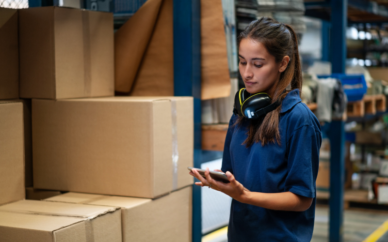 Delivery person handing package to customer